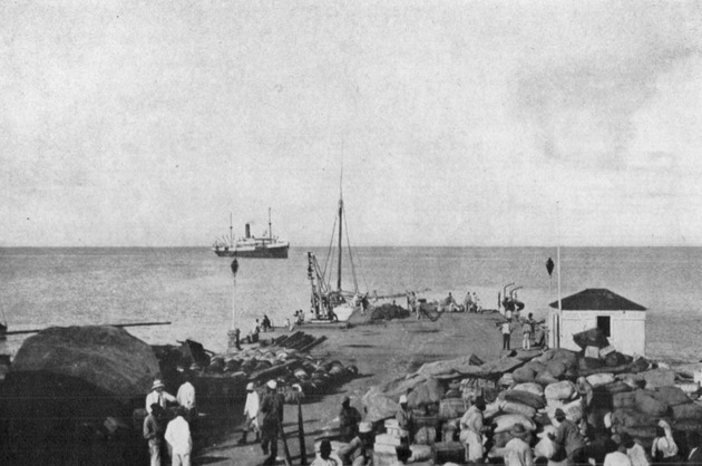 Wharf with cargo from calling steamer, Frederiksted, St. Croix