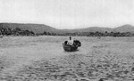 Water Bay and person bringing in fodder from Thatch Cay, St. Thomas